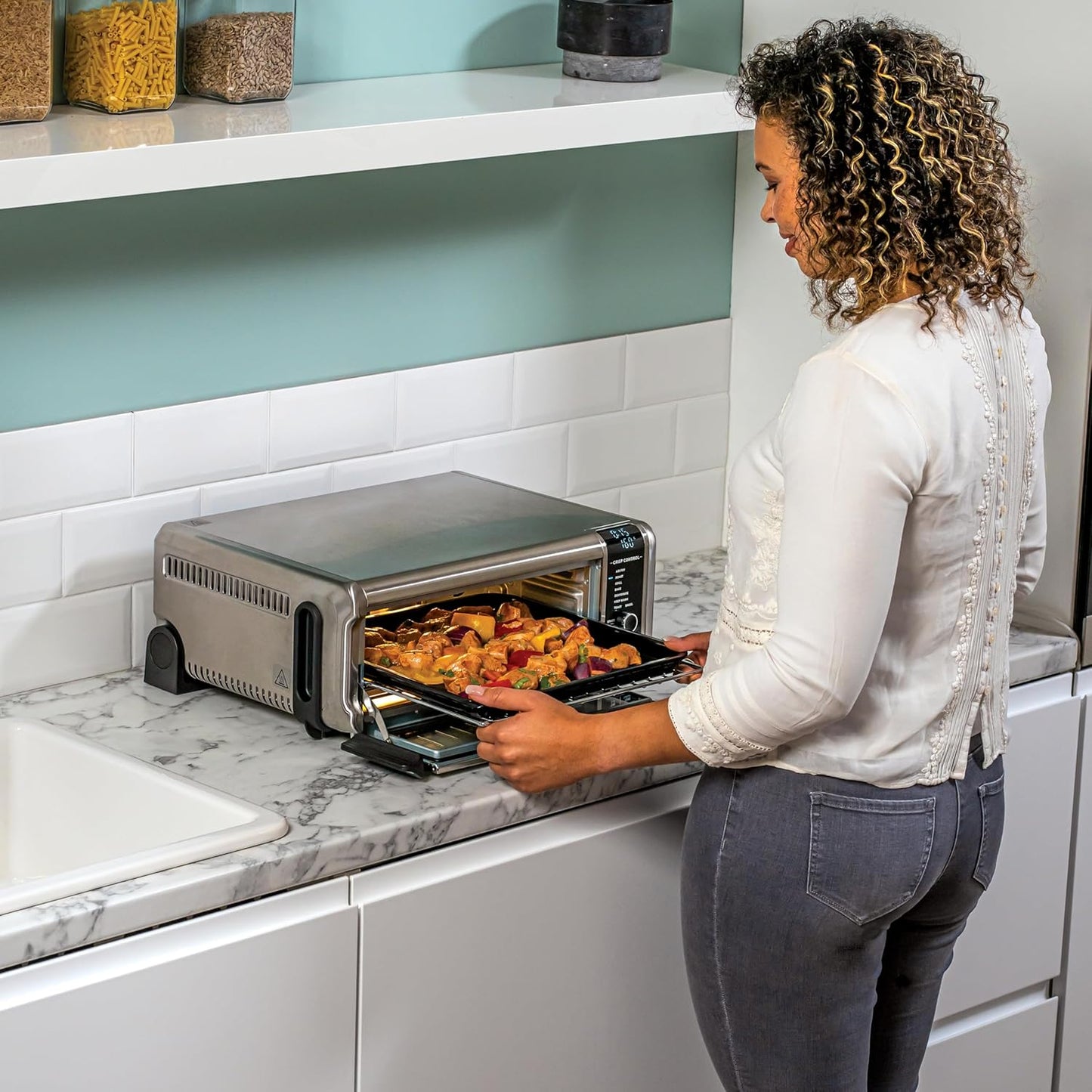 Ninja Foodi 8-in-1 Multifunction Oven, Portable Mini Oven, Work Surfaces, Multifunction Oven with 8 Cooking Functions; Air Fry, Roast, Grill, Bake and more. Silver/Black SP101EU